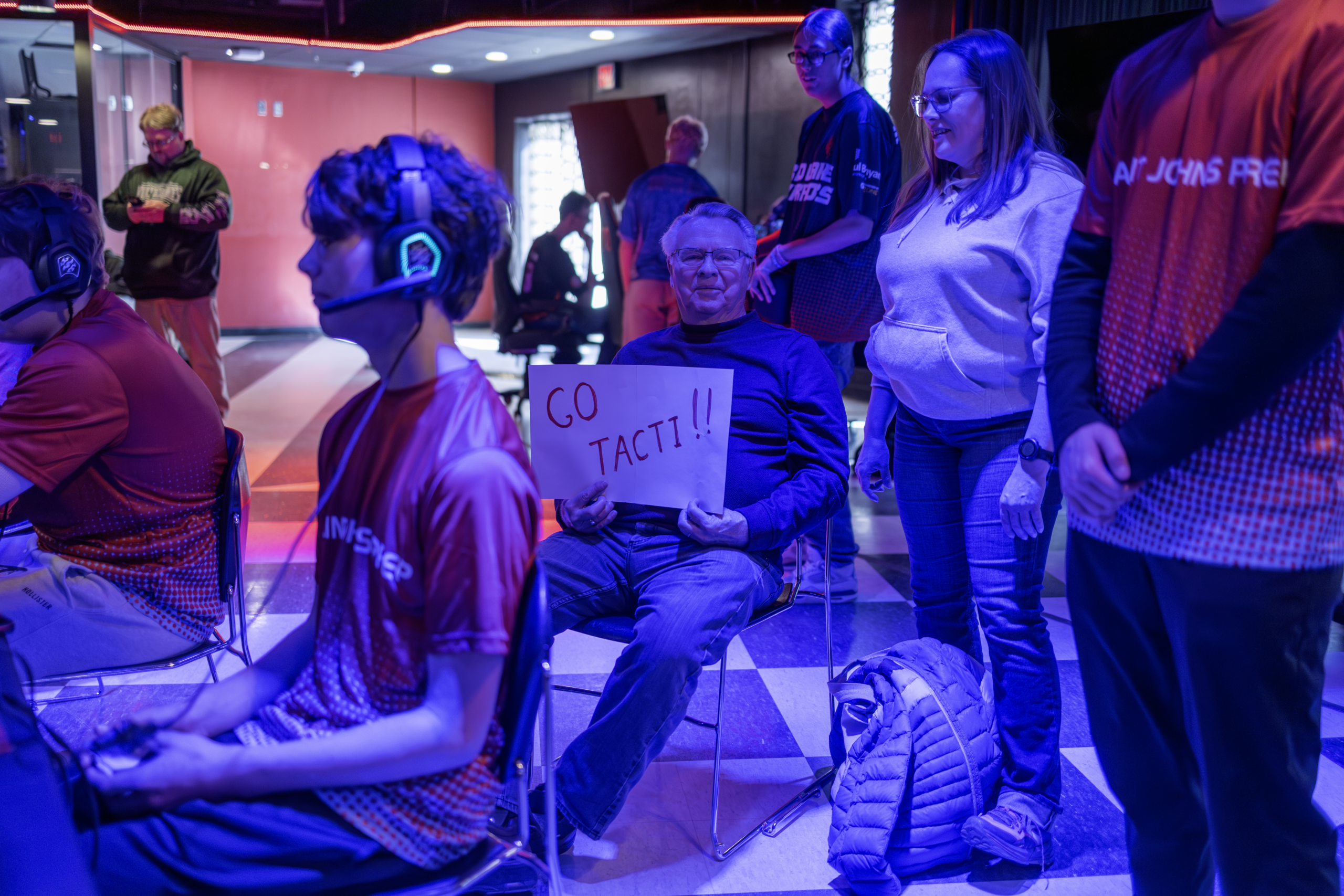 Parents watching their child compete at a Fenworks esports event